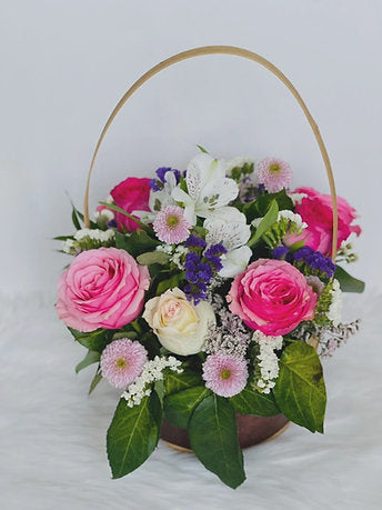 Dazzling Mix Fresh Flowers in a basket 