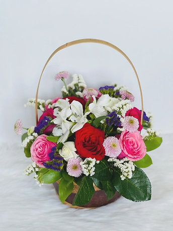 Dazzling Mix Fresh Flowers in a basket 