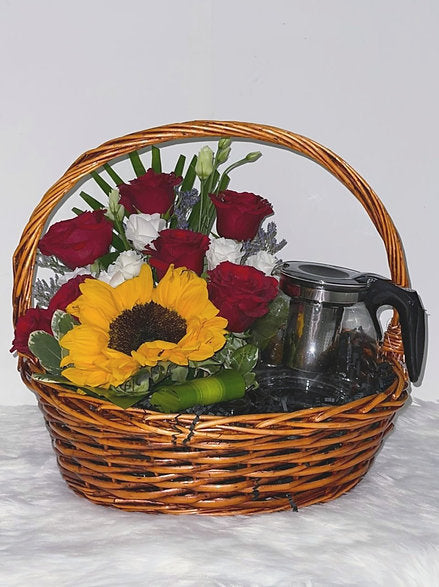 Radiant Fresh Sunflower and Roses in a Basket with Tea Glass Pot