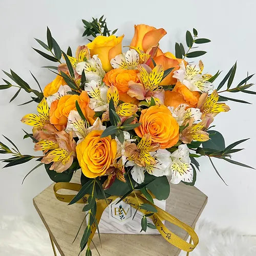 Charming Fresh Orange Flower in a Marble  Vase 