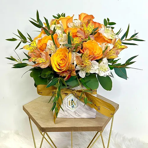 Charming Fresh Orange Flower in a Marble  Vase 